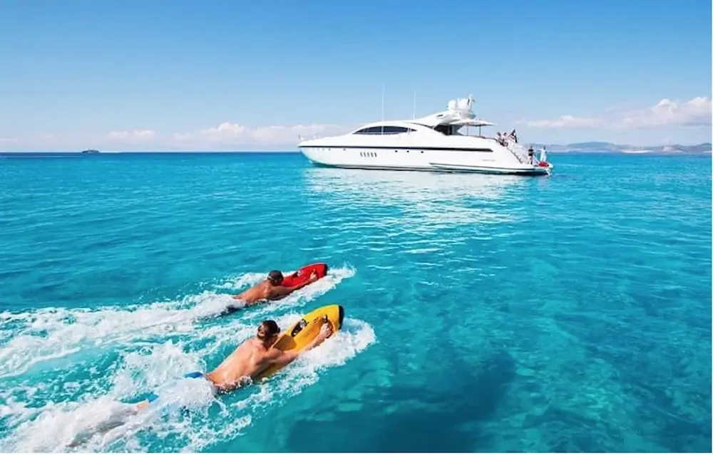 Yachtbeach inflatable platforms and pool zones deployed off the catamaran