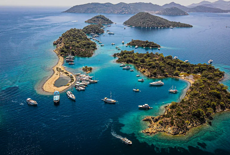 Boats anchored among the Yassica islets in Gocek bay, Turkiye