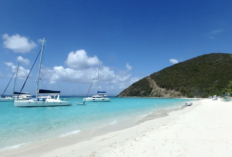 Charter catamarans anchored off White Bay beach, Jost Van Dyke, British Virgin Islands