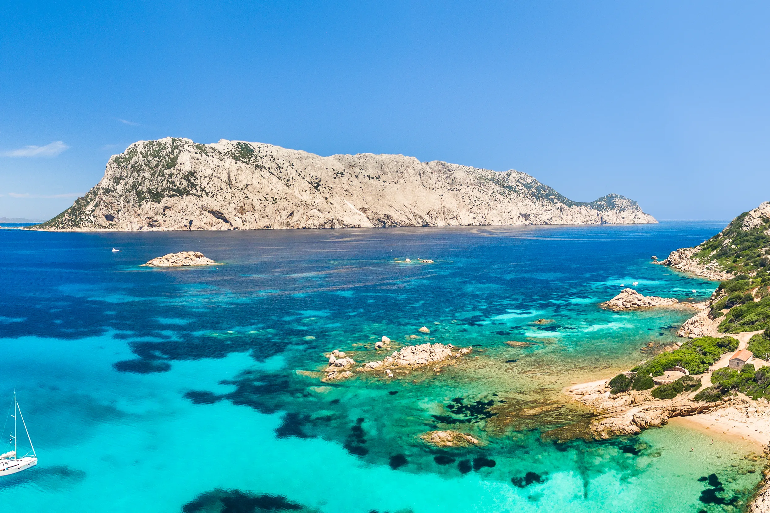 https://www.boat4you.com/wp-content/uploads/2026/06/quietest-mediterranean-charter-areas-august-crowds-main.webp
